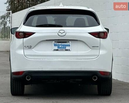 Белый Мазда СХ-5, объемом двигателя 2.49 л и пробегом 58 тыс. км за 11300 $, фото 5 на Automoto.ua