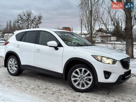 Белый Мазда СХ-5, объемом двигателя 2 л и пробегом 136 тыс. км за 12640 $, фото 1 на Automoto.ua