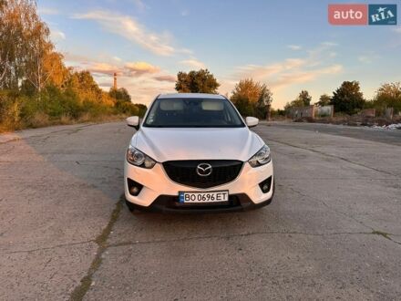 Белый Мазда СХ-5, объемом двигателя 2.19 л и пробегом 281 тыс. км за 9950 $, фото 1 на Automoto.ua