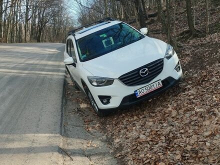 Белый Мазда СХ-5, объемом двигателя 2.49 л и пробегом 200 тыс. км за 9000 $, фото 1 на Automoto.ua