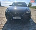 Черный Мазда СХ-5, объемом двигателя 2.2 л и пробегом 174 тыс. км за 12800 $, фото 1 на Automoto.ua