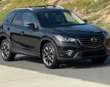 Чорний Мазда СХ-5, об'ємом двигуна 2.5 л та пробігом 78 тис. км за 10000 $, фото 2 на Automoto.ua