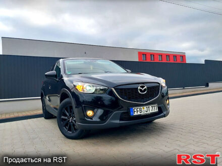 Черный Мазда СХ-5, объемом двигателя 2.2 л и пробегом 209 тыс. км за 12750 $, фото 1 на Automoto.ua