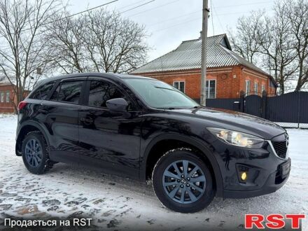 Чорний Мазда СХ-5, об'ємом двигуна 2 л та пробігом 165 тис. км за 12650 $, фото 1 на Automoto.ua