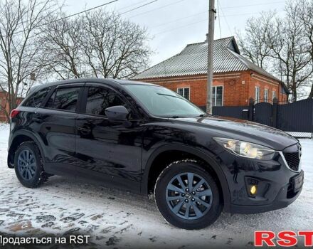 Черный Мазда СХ-5, объемом двигателя 2 л и пробегом 165 тыс. км за 12650 $, фото 1 на Automoto.ua