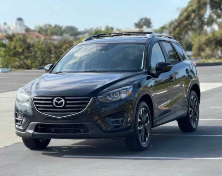 Черный Мазда СХ-5, объемом двигателя 2.5 л и пробегом 78 тыс. км за 10000 $, фото 1 на Automoto.ua