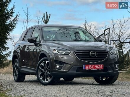 Коричневый Мазда СХ-5, объемом двигателя 2.2 л и пробегом 177 тыс. км за 15900 $, фото 1 на Automoto.ua