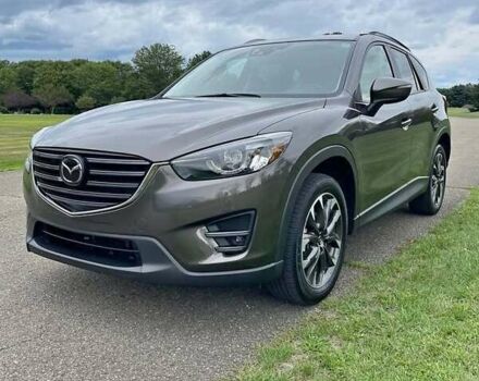 Коричневый Мазда СХ-5, объемом двигателя 2.49 л и пробегом 136 тыс. км за 15000 $, фото 1 на Automoto.ua