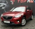 Червоний Мазда СХ-5, об'ємом двигуна 2 л та пробігом 240 тис. км за 10999 $, фото 3 на Automoto.ua