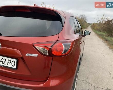 Мазда СХ-5 2012 у Умани на Automoto.ua Червоний Мазда СХ-5, об'ємом двигуна 2.19 л та пробігом 208 тис. км за 13400 $, фото 23 на Automoto.ua