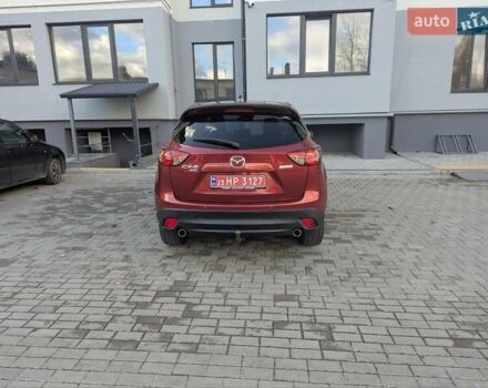 Мазда СХ-5 2012 в Дубно на Automoto.ua Красный Мазда СХ-5, объемом двигателя 2.2 л и пробегом 206 тыс. км за 13200 $, фото 26 на Automoto.ua
