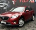 Червоний Мазда СХ-5, об'ємом двигуна 2 л та пробігом 240 тис. км за 10999 $, фото 4 на Automoto.ua