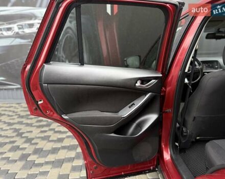 Червоний Мазда СХ-5, об'ємом двигуна 2 л та пробігом 240 тис. км за 10999 $, фото 44 на Automoto.ua