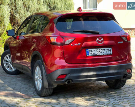 Червоний Мазда СХ-5, об'ємом двигуна 2 л та пробігом 160 тис. км за 10999 $, фото 6 на Automoto.ua