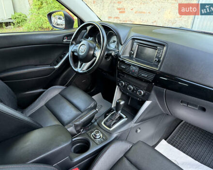 Мазда СХ-5 2014 в Дубно на Automoto.ua Красный Мазда СХ-5, объемом двигателя 2.2 л и пробегом 180 тыс. км за 14500 $, фото 38 на Automoto.ua