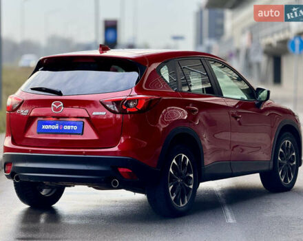 Красный Мазда СХ-5, объемом двигателя 2.19 л и пробегом 206 тыс. км за 16300 $, фото 4 на Automoto.ua