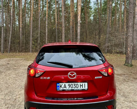 Червоний Мазда СХ-5, об'ємом двигуна 2 л та пробігом 150 тис. км за 15450 $, фото 1 на Automoto.ua