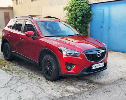Красный Мазда СХ-5, объемом двигателя 2.5 л и пробегом 169 тыс. км за 14500 $, фото 1 на Automoto.ua