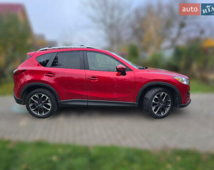 Красный Мазда СХ-5, объемом двигателя 2.49 л и пробегом 144 тыс. км за 16500 $, фото 1 на Automoto.ua