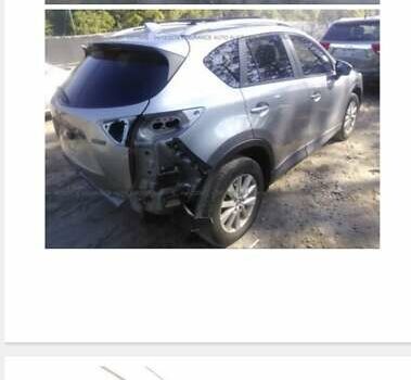 Серый Мазда СХ-5, объемом двигателя 2 л и пробегом 300 тыс. км за 12000 $, фото 14 на Automoto.ua