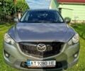 Серый Мазда СХ-5, объемом двигателя 2.19 л и пробегом 250 тыс. км за 10800 $, фото 1 на Automoto.ua
