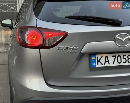 Серый Мазда СХ-5, объемом двигателя 2 л и пробегом 330 тыс. км за 9500 $, фото 6 на Automoto.ua