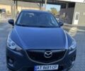 Серый Мазда СХ-5, объемом двигателя 2.2 л и пробегом 279 тыс. км за 12700 $, фото 1 на Automoto.ua