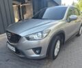 Серый Мазда СХ-5, объемом двигателя 2.2 л и пробегом 260 тыс. км за 10598 $, фото 1 на Automoto.ua