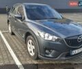 Серый Мазда СХ-5, объемом двигателя 2.2 л и пробегом 190 тыс. км за 13000 $, фото 1 на Automoto.ua