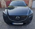 Серый Мазда СХ-5, объемом двигателя 2.19 л и пробегом 165 тыс. км за 15400 $, фото 1 на Automoto.ua