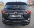 Серый Мазда СХ-5, объемом двигателя 2.49 л и пробегом 180 тыс. км за 14500 $, фото 4 на Automoto.ua