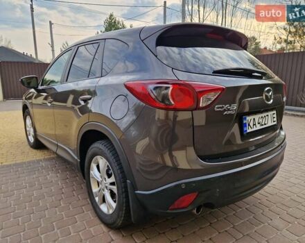 Серый Мазда СХ-5, объемом двигателя 2.19 л и пробегом 145 тыс. км за 18900 $, фото 6 на Automoto.ua