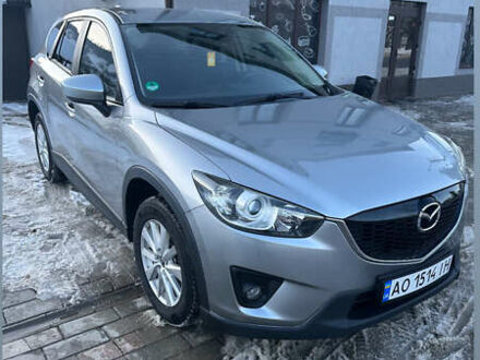 Серый Мазда СХ-5, объемом двигателя 2.19 л и пробегом 250 тыс. км за 12500 $, фото 1 на Automoto.ua