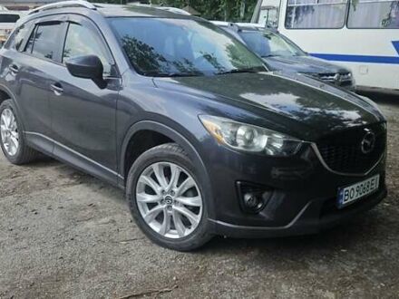 Серый Мазда СХ-5, объемом двигателя 2.49 л и пробегом 280 тыс. км за 13000 $, фото 1 на Automoto.ua