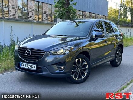 Серый Мазда СХ-5, объемом двигателя 2.2 л и пробегом 229 тыс. км за 14900 $, фото 1 на Automoto.ua