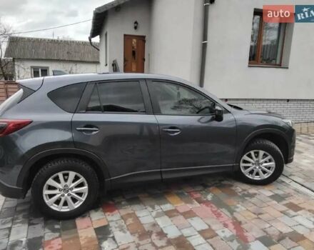 Синий Мазда СХ-5, объемом двигателя 2.19 л и пробегом 260 тыс. км за 12500 $, фото 39 на Automoto.ua