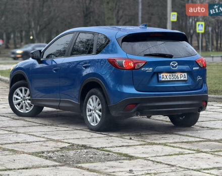 Синий Мазда СХ-5, объемом двигателя 2.5 л и пробегом 241 тыс. км за 12500 $, фото 2 на Automoto.ua