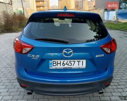 Синій Мазда СХ-5, об'ємом двигуна 2 л та пробігом 228 тис. км за 10900 $, фото 4 на Automoto.ua