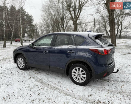 Синий Мазда СХ-5, объемом двигателя 2.19 л и пробегом 275 тыс. км за 12500 $, фото 63 на Automoto.ua