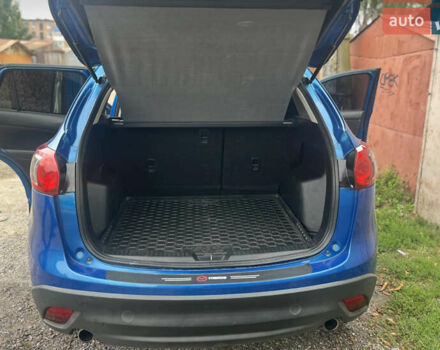 Синий Мазда СХ-5, объемом двигателя 2 л и пробегом 206 тыс. км за 12700 $, фото 5 на Automoto.ua