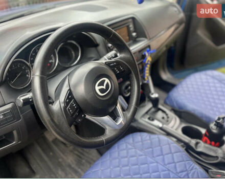 Синий Мазда СХ-5, объемом двигателя 2 л и пробегом 206 тыс. км за 12700 $, фото 6 на Automoto.ua