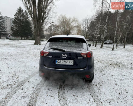 Синий Мазда СХ-5, объемом двигателя 2.19 л и пробегом 275 тыс. км за 12500 $, фото 58 на Automoto.ua