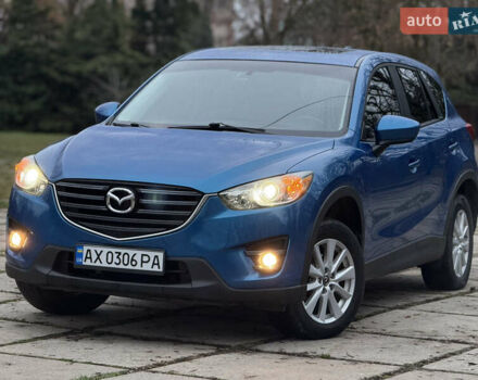 Синий Мазда СХ-5, объемом двигателя 2.5 л и пробегом 241 тыс. км за 12500 $, фото 3 на Automoto.ua