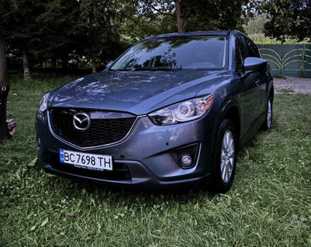 Синий Мазда СХ-5, объемом двигателя 2.49 л и пробегом 149 тыс. км за 12500 $, фото 3 на Automoto.ua