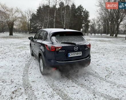 Синий Мазда СХ-5, объемом двигателя 2.19 л и пробегом 275 тыс. км за 12500 $, фото 59 на Automoto.ua