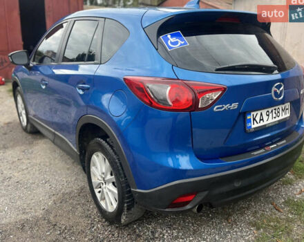 Синий Мазда СХ-5, объемом двигателя 2 л и пробегом 206 тыс. км за 12700 $, фото 4 на Automoto.ua