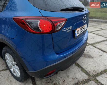 Синий Мазда СХ-5, объемом двигателя 2.5 л и пробегом 241 тыс. км за 12500 $, фото 6 на Automoto.ua