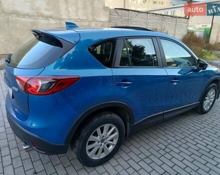 Синій Мазда СХ-5, об'ємом двигуна 2 л та пробігом 228 тис. км за 10900 $, фото 5 на Automoto.ua