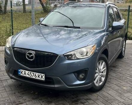 Синий Мазда СХ-5, объемом двигателя 2.5 л и пробегом 142 тыс. км за 13400 $, фото 2 на Automoto.ua