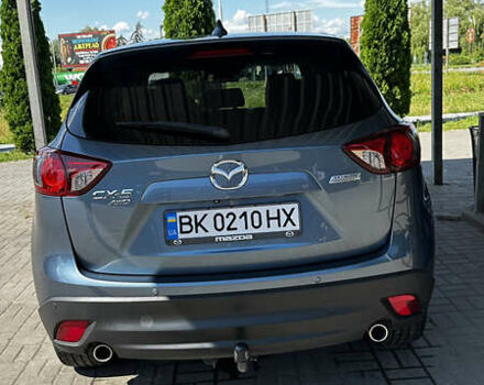 Синий Мазда СХ-5, объемом двигателя 2.19 л и пробегом 260 тыс. км за 15599 $, фото 4 на Automoto.ua